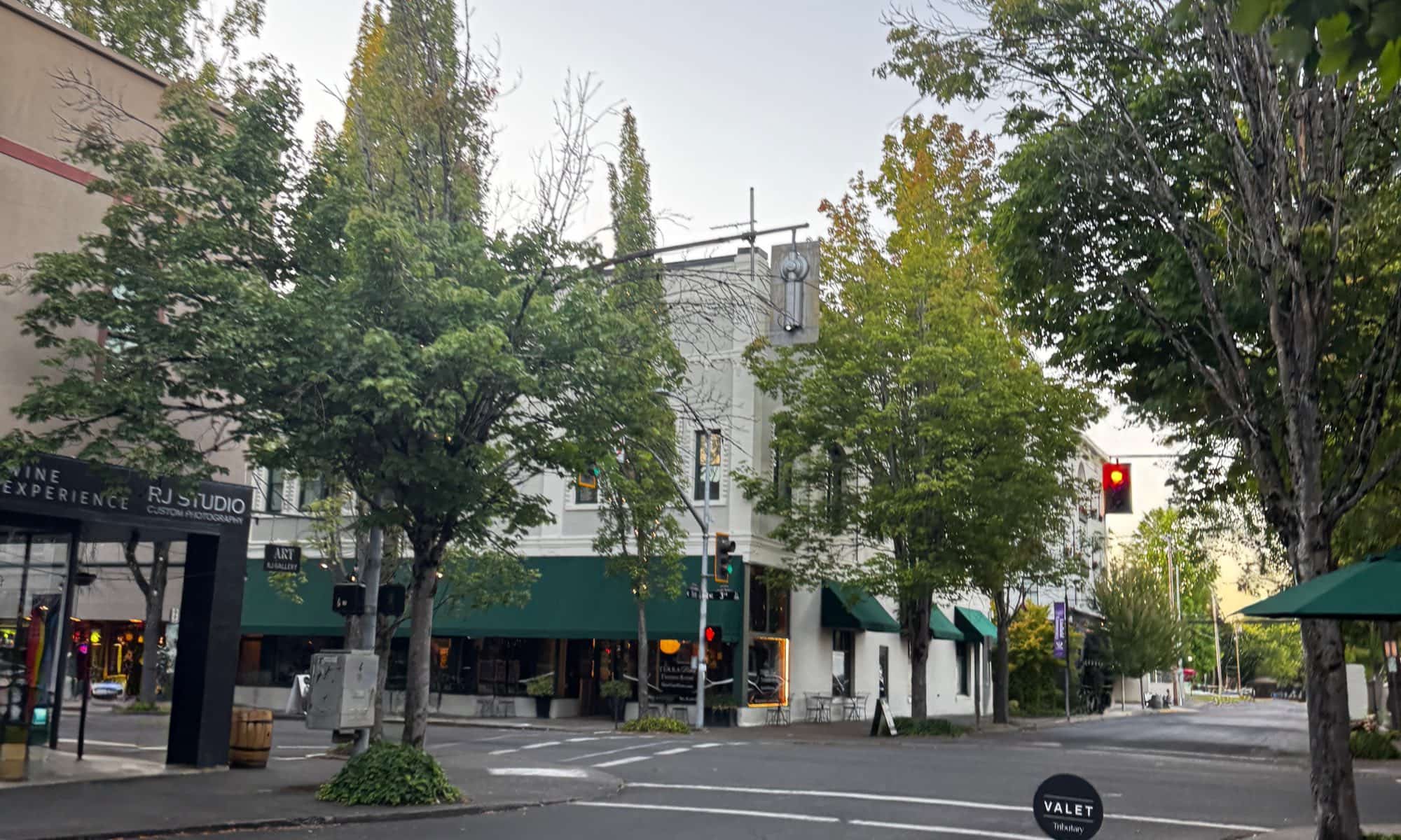 The corner of Third and Ford Streets in downtown McMinnville, Oregon at dawn, the historic downtown home of Abraham Hanson Law's criminal defense, injury, immigration, and estate practice